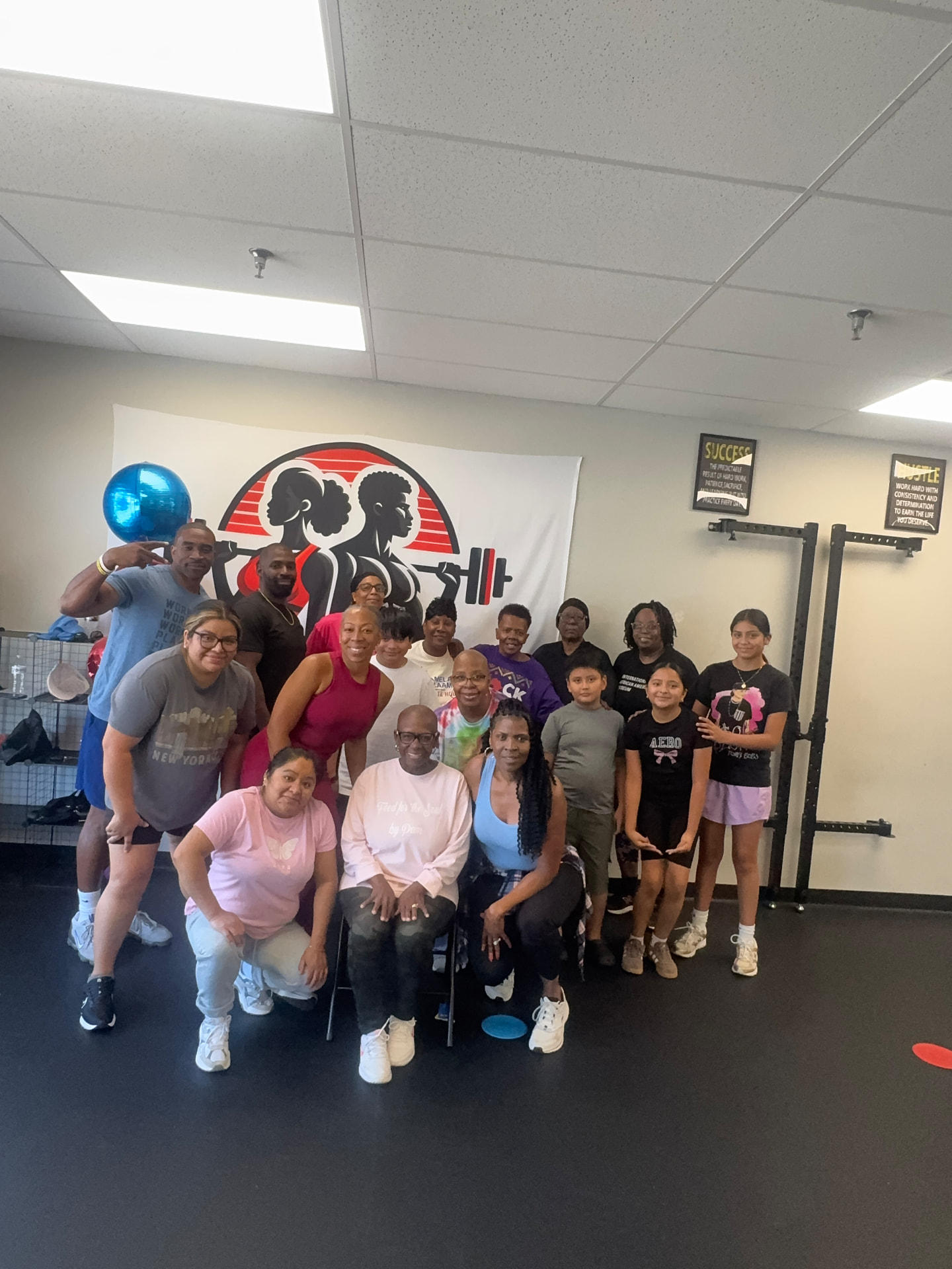 All ages family group photo at 4th Quarter Fitness