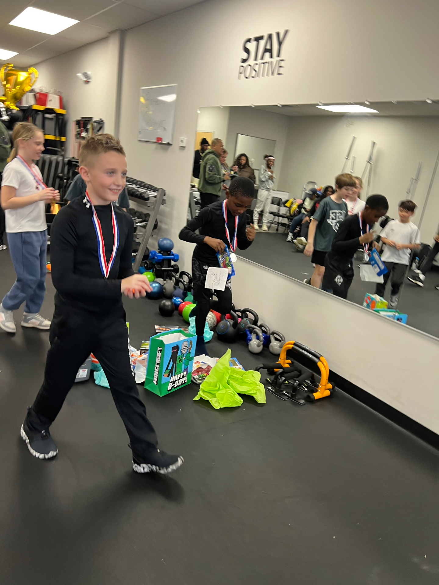 Youth celebrating at 4th Quarter Fitness